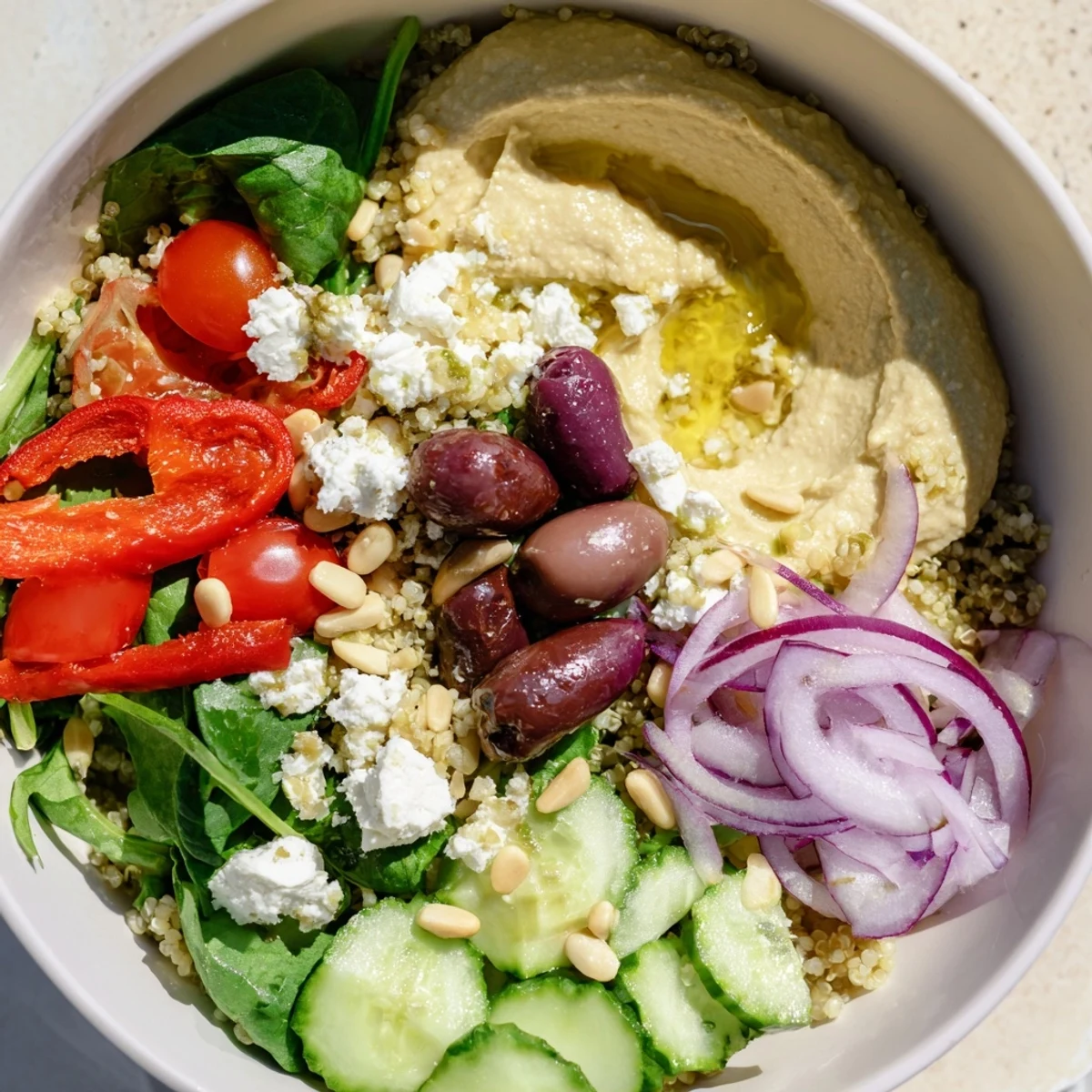Healthy Mediterranean Hummus Bowl garnished with parsley, perfect for a light vegetarian lunch or dinner.