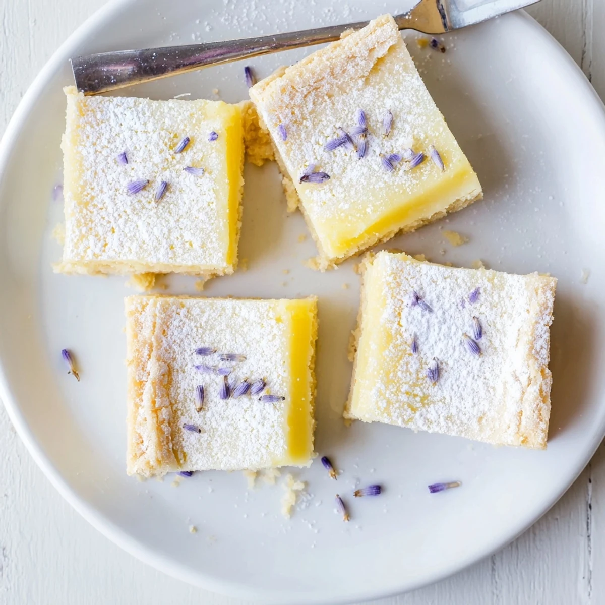Buttery crust topped with creamy lemon lavender filling and light sugar coating