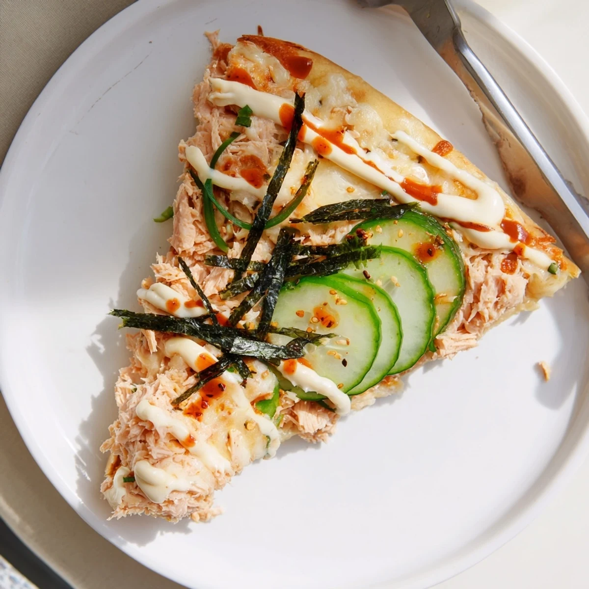 Salmon Sushi Bake Flatbread Pizza With Spicy Drizzle, bubbling cheese and flaky salmon  