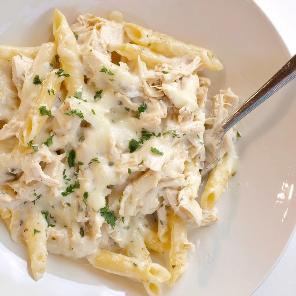 Creamy Chicken Alfredo Bake With Mozzarella Crust bubbling, savory aroma, cheese stretching